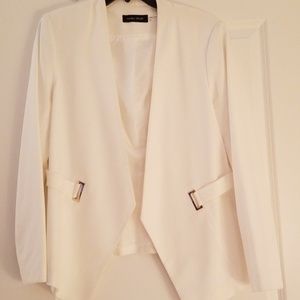 Beautiful white blazer with gold detail.